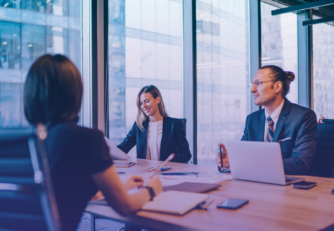 Prosperous team of accountants discussing business planning during productive cooperation in firm. Outsourcing has boosted efficiency in the accounting firm.